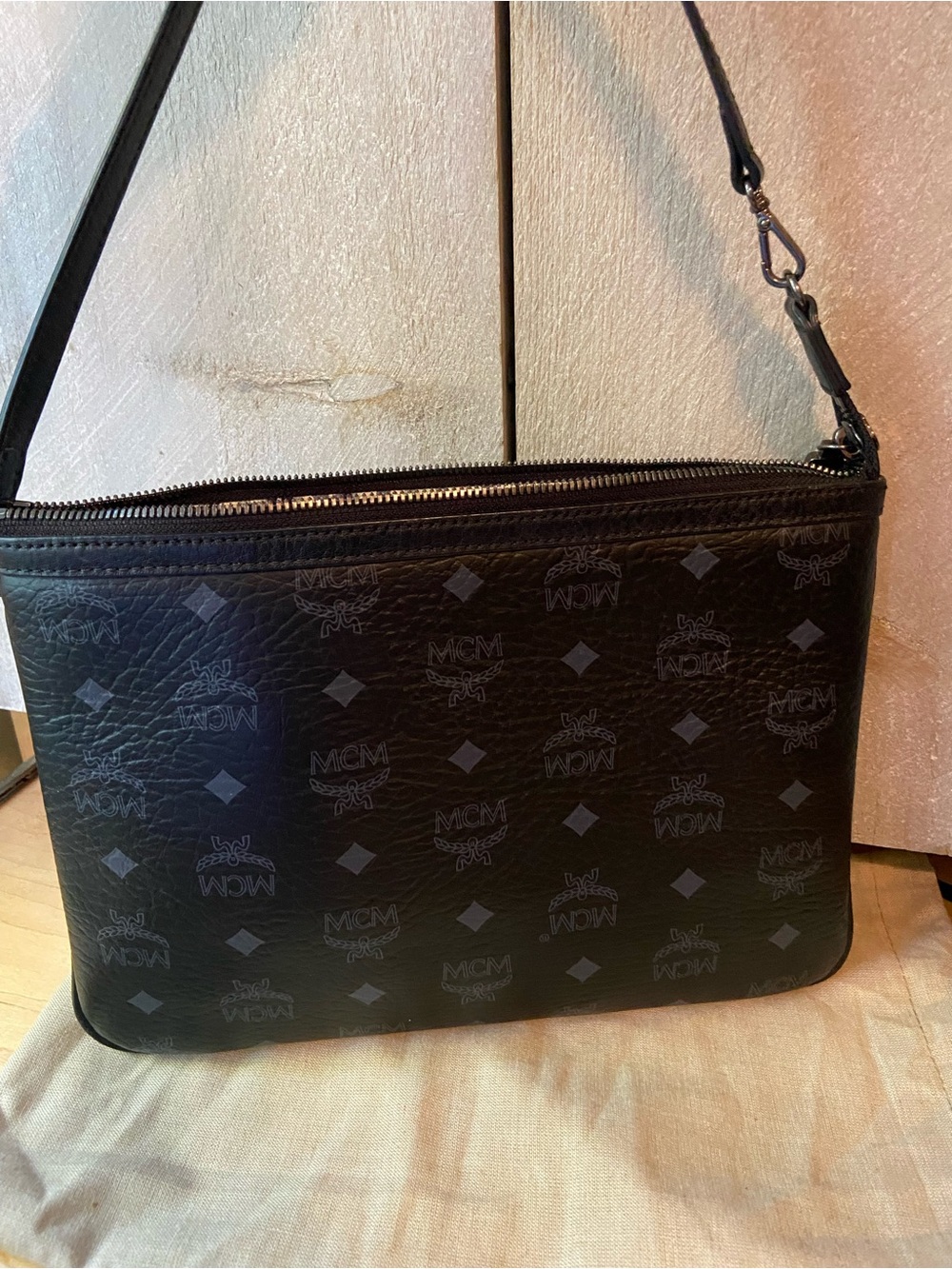 MCM Black Leather Crossbody Bag - Signature Logo Design